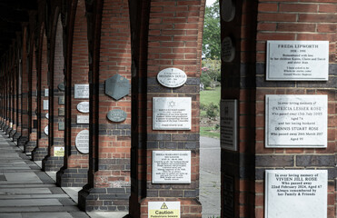 Perspective of Red brick columns and arches an Historic Building in Golders Green Crematorium and...