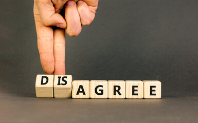 Agree or disagree symbol. Concept words Agree Disagree on beautiful wooden blocks. Beautiful grey...