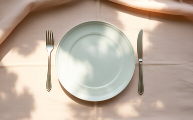 empty plate with fork and knife