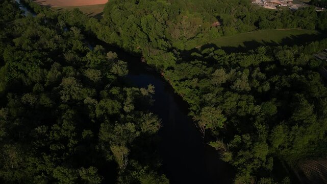 Aerial looking down on Yadkin River in Elkin North Carolina at sunset