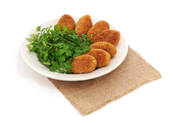 Cutlets on a plate.
