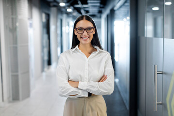 Portrait of happy young European professional businesswoman ceo, female corporate executive leader...