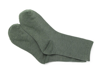 Pair of green socks isolated on white, top view