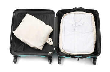 Open suitcase with packing cubes isolated on white, top view