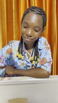 attractive african american girl using laptop for the first time