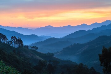 Obraz premium Scenic mountain range view during sunset or sunrise for travel, nature photography, and landscape design projects.