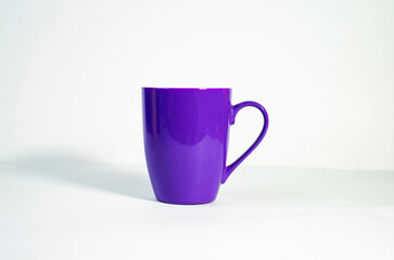 Bold Purple Ceramic Tea Mug with Handle in White Studio Light