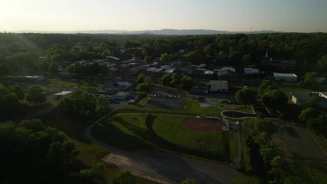 Aerial of baseball diamond and homes in rural town of Elkin North Carolina