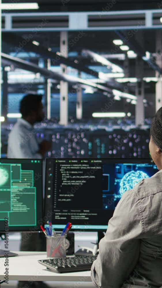 Poster vertical video server farm it expert responds to security breach alert displayed on computer monitor