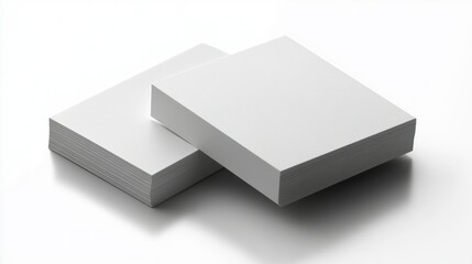 Two stacks of blank square sticky notes