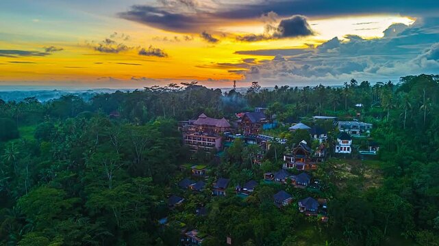 Kayon Jungle Resort, Bali, Indonesia - A Serene Resort Nestled in Lush Greenery Beneath a Vibrant Sunset Sky - Hyperlapse