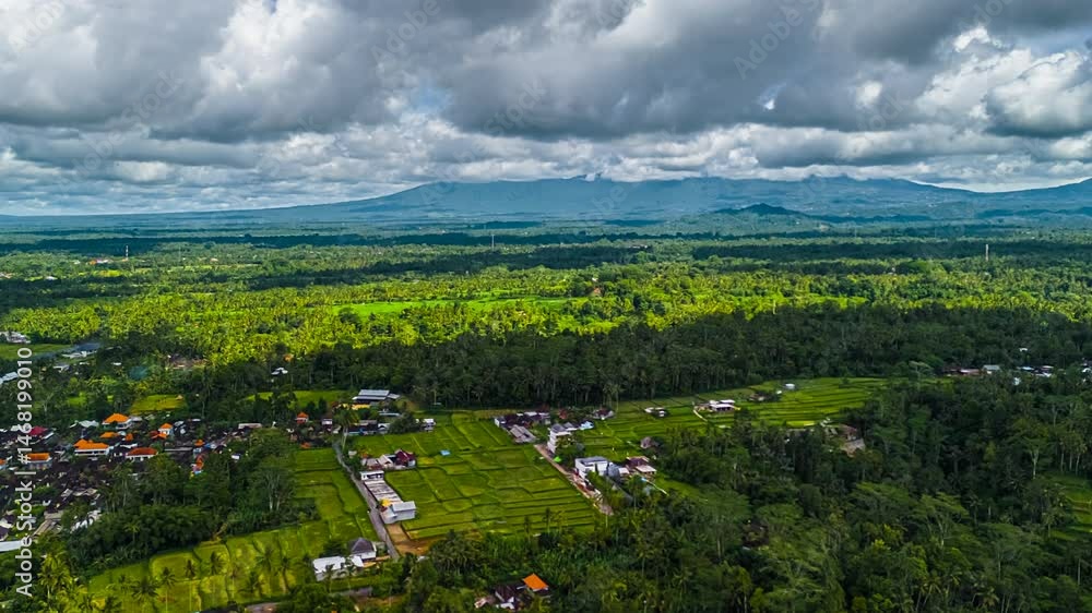 Aufkleber time-lapse shows clouds drifting by, casting dynamic shadows over green forests and open fields.