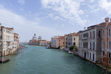 Venice, Italy - April 17 2025: Grand Canal with Santa Maria della Salute and historic buildings in...