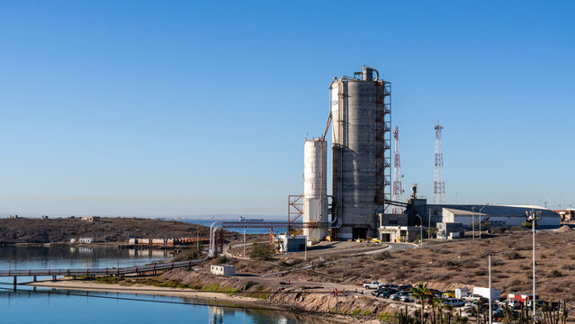 La Paz, Baja California Sur, Mexico - March 17, 2025: Cemex cement factory at the Puerto de Pichilinque.