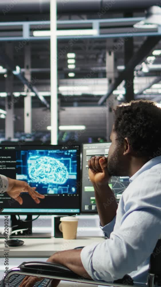 Poster vertical video admin in wheelchair and data center coworker working together using ai node tree soft