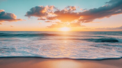 Fototapeta premium Sunset on a serene beach with gentle waves lapping at the shore during a clear evening