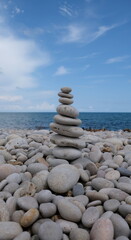 Fototapeta premium Pyramid of sea pebbles. Life balance and harmony concept.