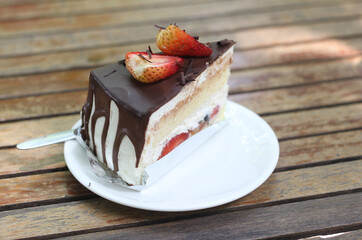 Delicious cake with strawberries and chocolate.