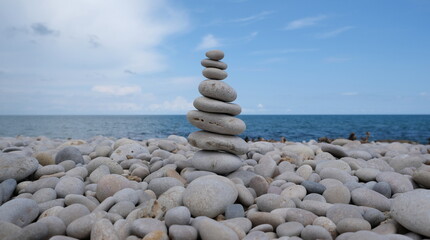 Pyramid of sea pebbles. Life balance and harmony concept.