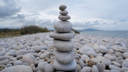 Pyramid of sea pebbles. Life balance and harmony concept.