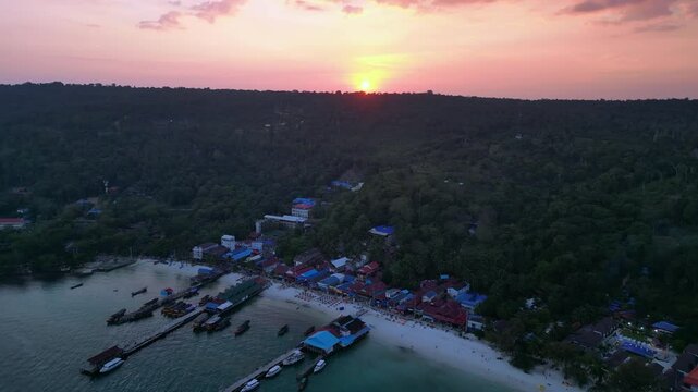 9.3.25 Koh Rong KHM, sunset island village. Dramatic aerial view flight drone