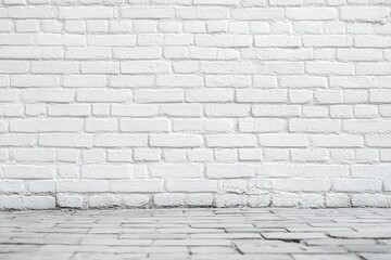 Empty room with a white painted brick wall and a stone tiled floor showing a rustic, minimalist interior space