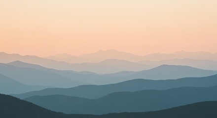 Fototapeta premium Serene mountain range landscape with layers of blue and peach hues