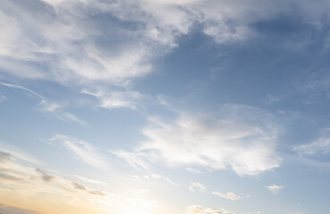 Front view and full frame of beautiful morning or evening blue and orange sky with cloudy while sunsets or sunrises taken at the sea used as natural blackground texture