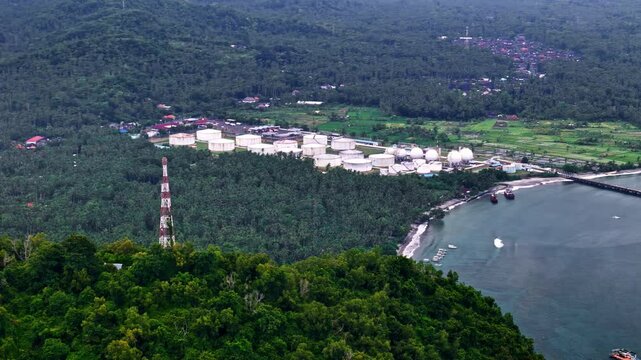 Oil refinery plant Bali Indonesia aerial drone Pertamina TBBM Manggis island coastline