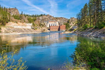 Fototapeta premium The hydroelectric powerplant reservoir and dam along the Spokane River at Long Lake, Lake Spokane, Washington State.