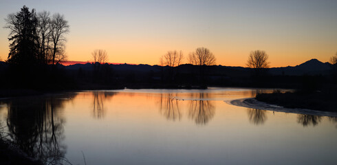 Tranquil morning with contours of mountains and volcano