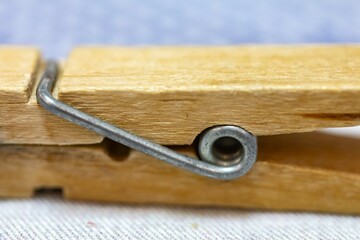 Fototapeta premium Wooden clothespin or clamp in macro detail