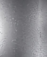 Highly reflective silver surface with subtle scratches,  steel,  aluminum,  industrial