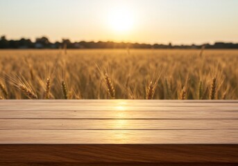 Empty wooden table overlooking a golden wheat field at sunrise. Rustic, agricultural background with copy space for food or product placement