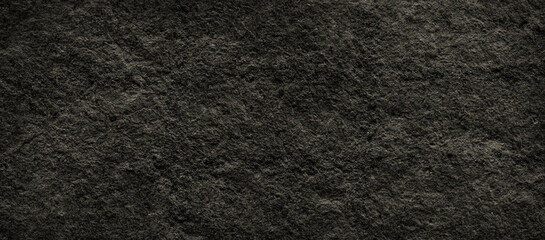 Dark rough stone texture with natural grunge surface look
