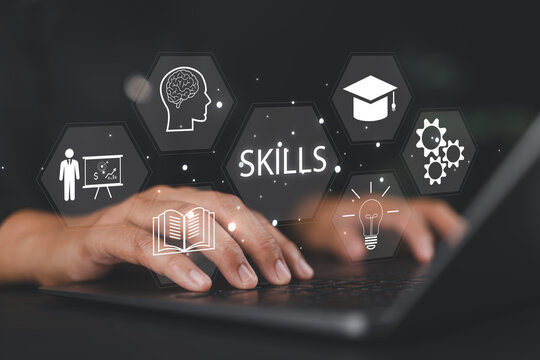 Up skill and personal development concept. Human resource development, leadership thinking upskill competency, creativity and problem solving. Man using laptop with skills icon on virtual screen.