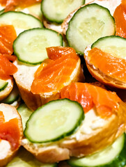 Savory delights of smoked salmon and cucumber served on freshly baked bread in a delightful summer spread