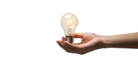 Hand holding radiant light bulb idea
