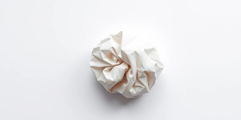 A flat sheet of paper is progressively crumpled into a tight ball, material, art