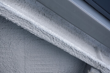 Cement rough ceiling in unfinished interior during renovation.