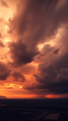 Obraz premium Picturesque Sunset with Dramatic Clouds Over Tropical Horizon - A Stunning Natural Beauty