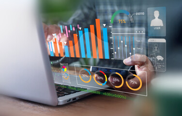 Business  works on laptop Showing business analytics dashboard with charts, metrics, and KPI to...