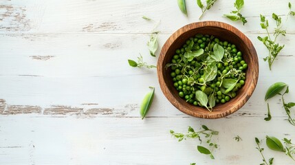 Fresh green peas and herbs in a wooden bowl (1)