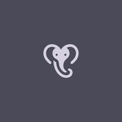 Elephant logo with a heart symbol in creative composition.