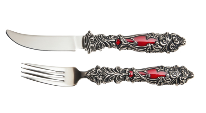 Ornate silver-toned cutlery set with red accents