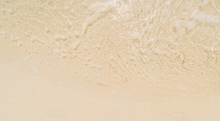 water on sand beach