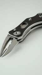 Close-up of a sleek multi-tool knife.