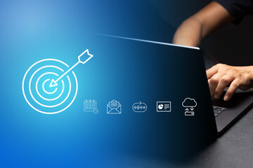 A person working on laptop with business strategy concept.