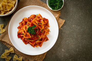 farfalle pasta in tomato sauce with parsley