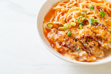ramen noodles with gyoza or pork dumplings